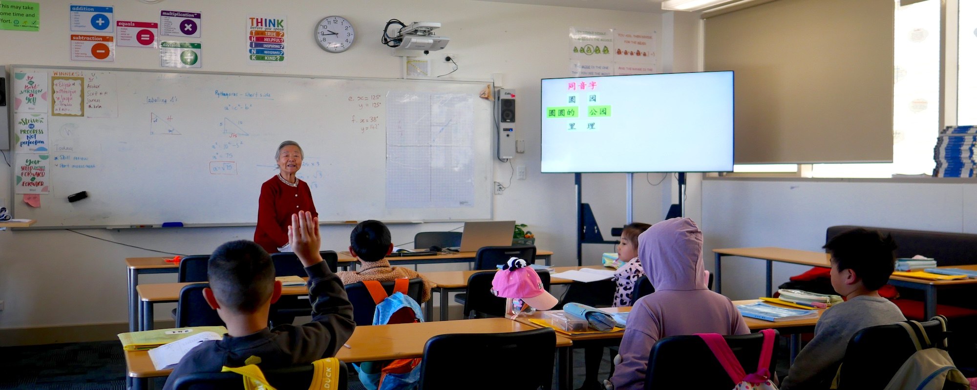 A teacher leading a Chinese class at Canberra Chinese School
